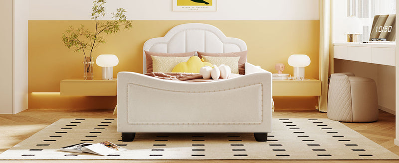 Twin Size Upholstered Daybed with Cloud Shaped Headboard, Embedded Elegant Copper Nail Design, Beige